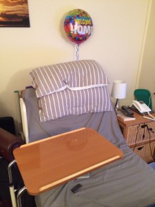 My current bed setup: The table, the bed and the Welcome Home balloon! 