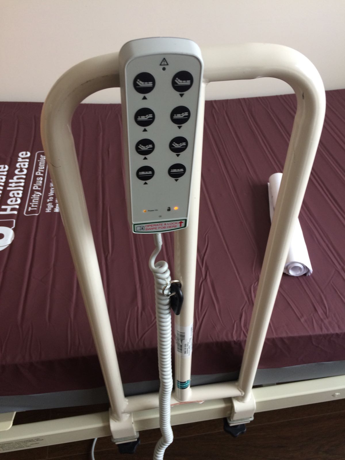 This bar helps me move up and out of the bed, while the buttons are used to move the bed itself. It helps both my head and legs move up while it can also move the bed itself up and down. A very helpful bit of kit!